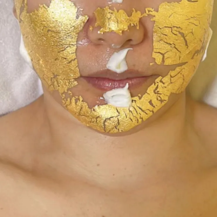 24K gold leaf mask applied during the Golden Anti-Aging Treatment at The Beauty Story Skincare